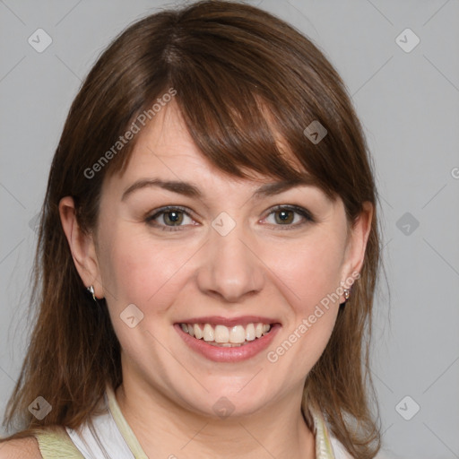 Joyful white young-adult female with medium  brown hair and blue eyes