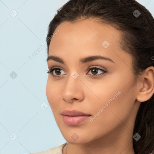 Neutral white young-adult female with long  brown hair and brown eyes