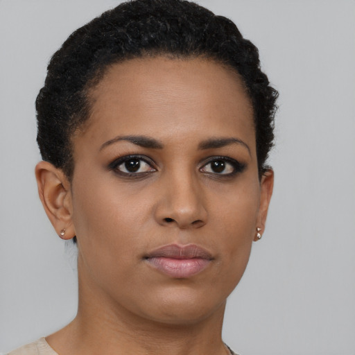 Neutral black young-adult female with short  brown hair and brown eyes