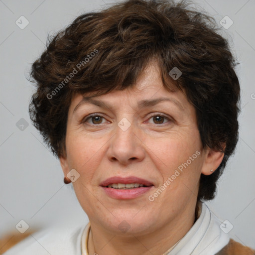 Joyful white adult female with short  brown hair and brown eyes