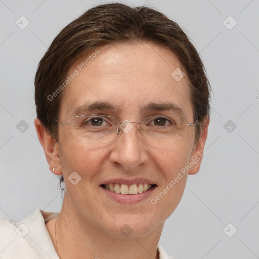 Joyful white adult female with short  brown hair and brown eyes