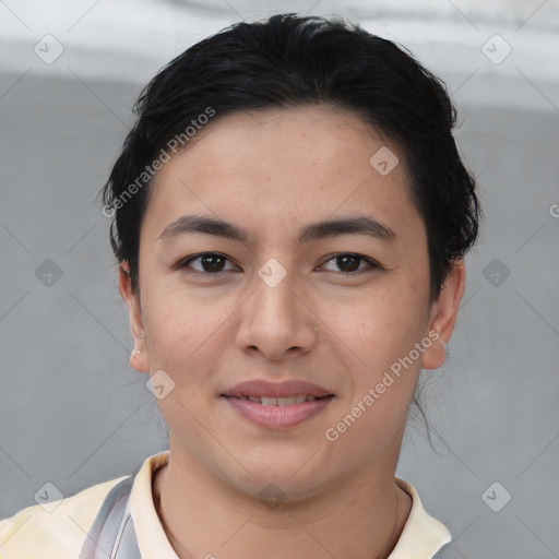 Joyful asian young-adult female with short  black hair and brown eyes