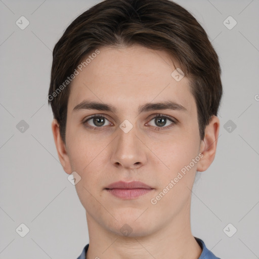 Neutral white young-adult male with short  brown hair and brown eyes