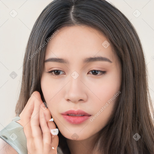 Neutral asian young-adult female with long  brown hair and brown eyes