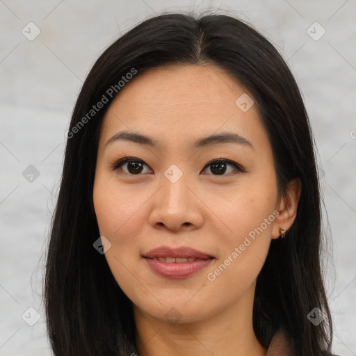 Joyful asian young-adult female with long  brown hair and brown eyes