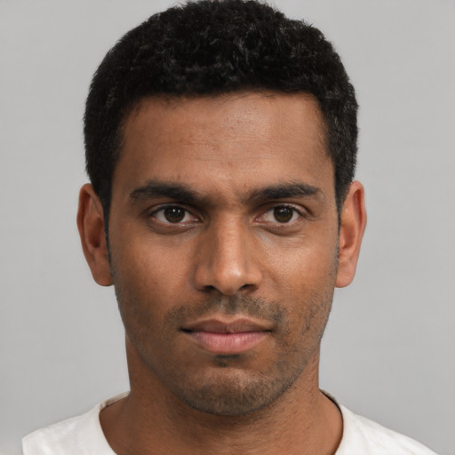 Neutral white young-adult male with short  black hair and brown eyes