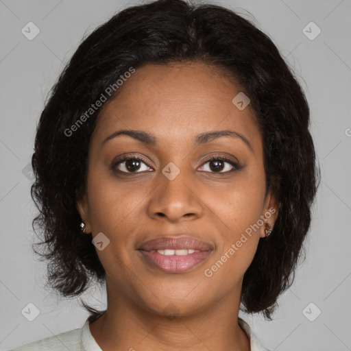 Joyful black young-adult female with medium  brown hair and brown eyes