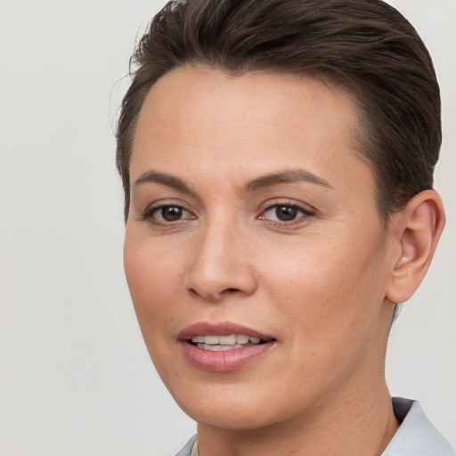 Joyful white young-adult female with short  brown hair and brown eyes