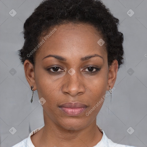 Neutral black young-adult female with short  brown hair and brown eyes