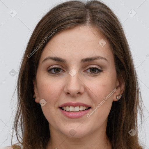 Joyful white young-adult female with long  brown hair and grey eyes