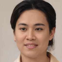 Joyful white young-adult female with medium  brown hair and brown eyes