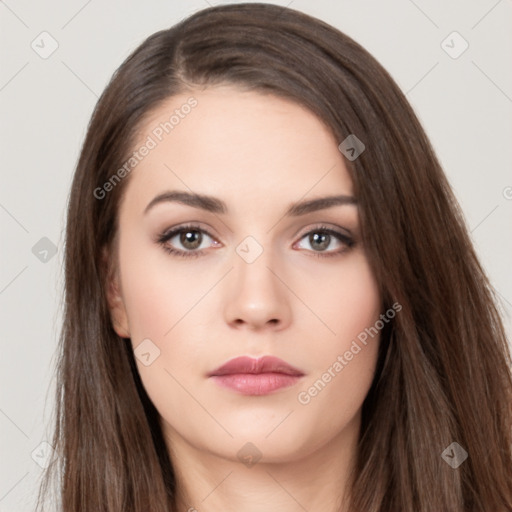 Neutral white young-adult female with long  brown hair and brown eyes