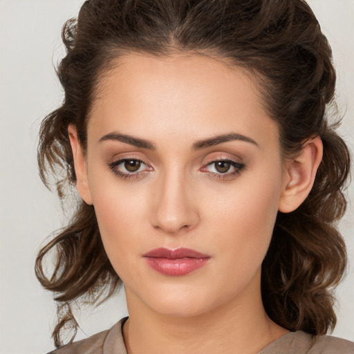 Neutral white young-adult female with medium  brown hair and brown eyes