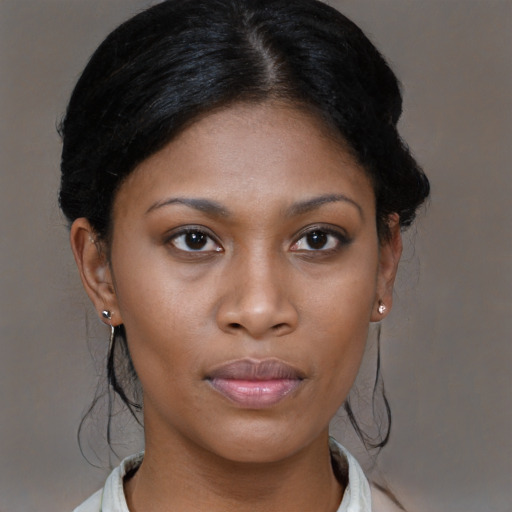 Neutral black young-adult female with medium  brown hair and brown eyes