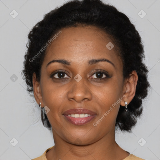 Joyful black young-adult female with medium  black hair and brown eyes