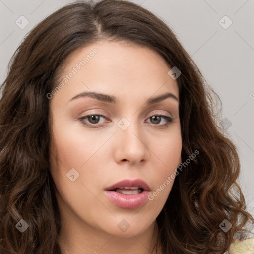 Neutral white young-adult female with long  brown hair and brown eyes