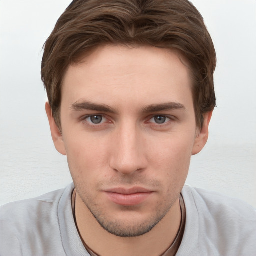 Neutral white young-adult male with short  brown hair and grey eyes