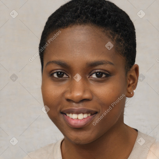 Joyful black young-adult female with short  brown hair and brown eyes