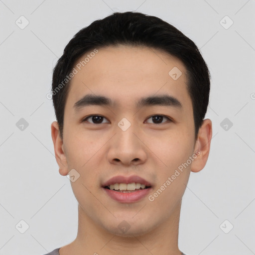 Joyful asian young-adult male with short  black hair and brown eyes