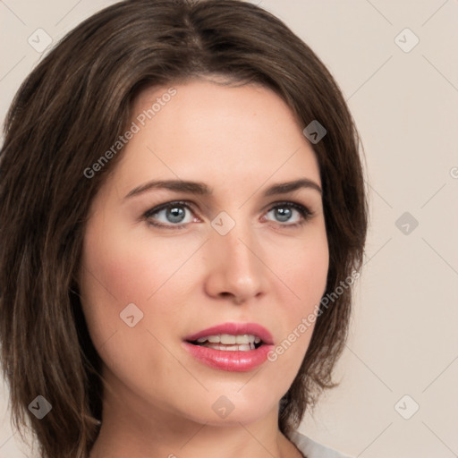 Joyful white young-adult female with medium  brown hair and green eyes