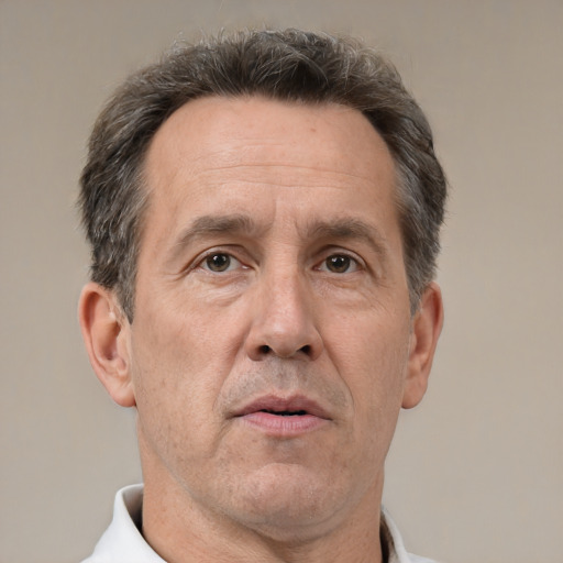 Neutral white middle-aged male with short  brown hair and brown eyes