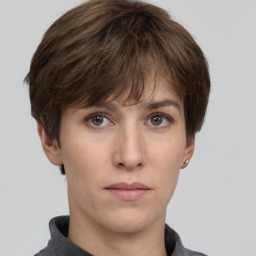 Neutral white young-adult female with short  brown hair and brown eyes