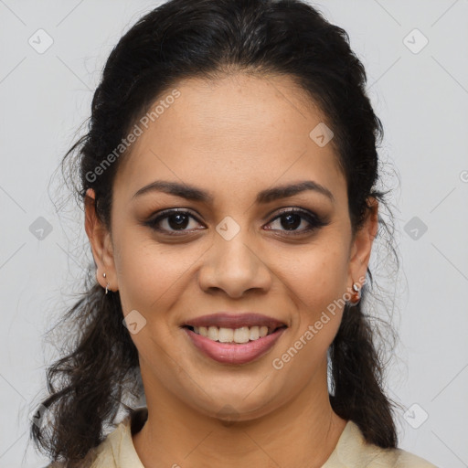 Joyful latino young-adult female with medium  brown hair and brown eyes