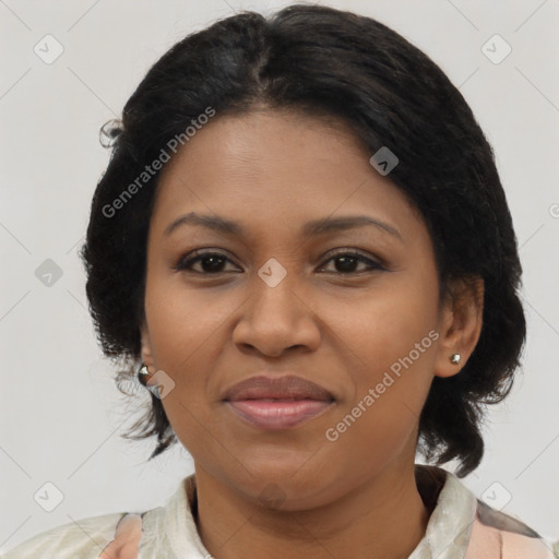 Joyful black young-adult female with medium  brown hair and brown eyes