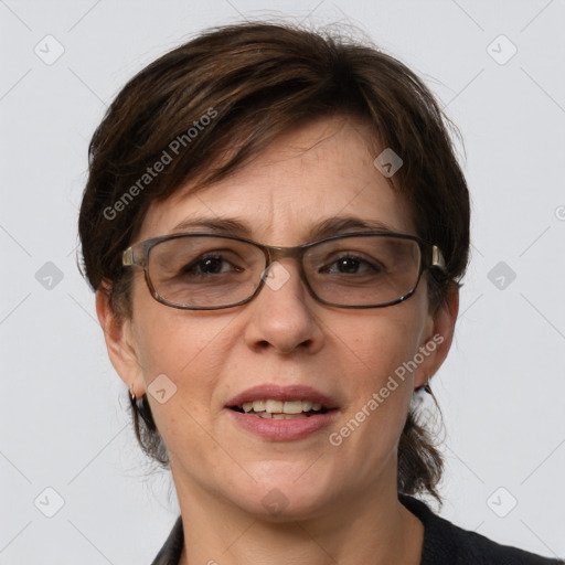 Joyful white adult female with medium  brown hair and grey eyes