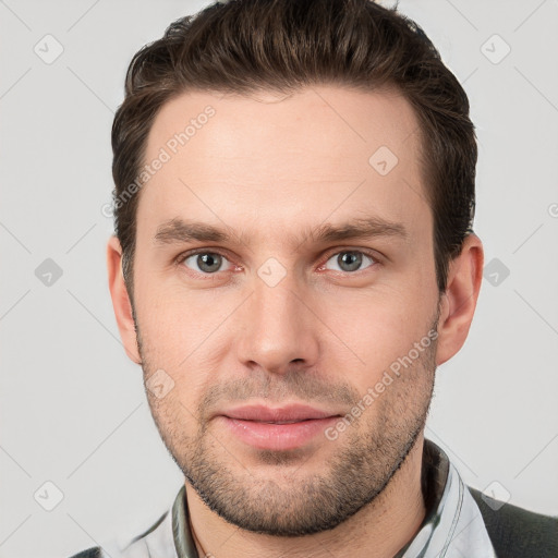 Neutral white young-adult male with short  brown hair and grey eyes