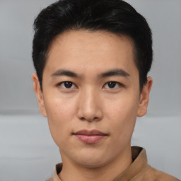 Neutral asian young-adult male with short  brown hair and brown eyes