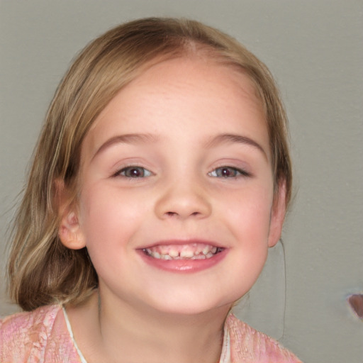 Joyful white child female with medium  brown hair and blue eyes