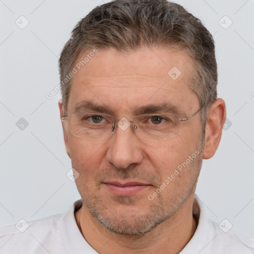 Joyful white middle-aged male with short  brown hair and brown eyes