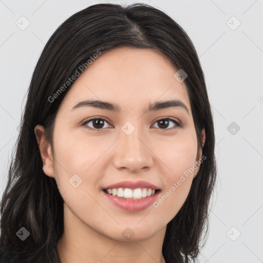 Joyful white young-adult female with long  black hair and brown eyes