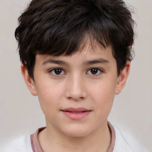 Joyful white child male with short  brown hair and brown eyes