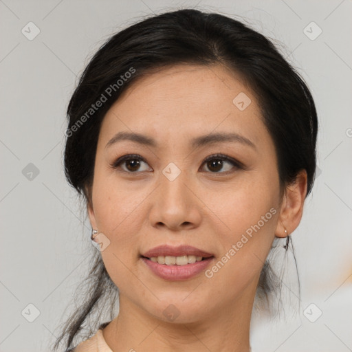 Joyful white adult female with medium  brown hair and brown eyes