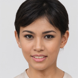 Joyful asian young-adult female with short  brown hair and brown eyes