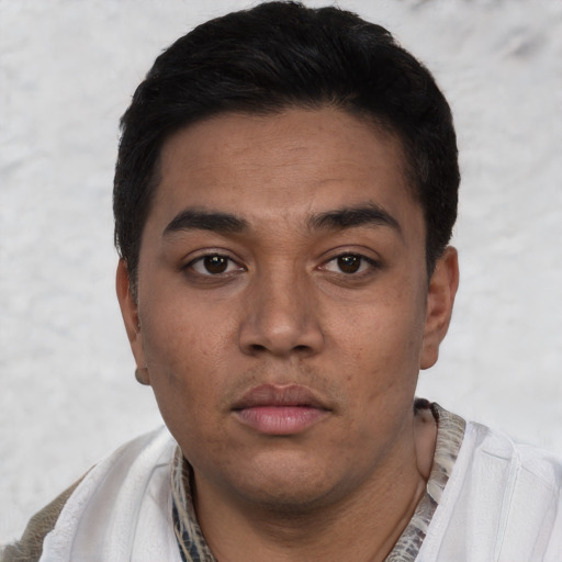 Neutral white young-adult male with short  black hair and brown eyes