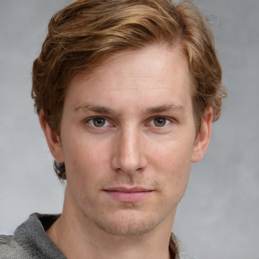 Neutral white young-adult male with short  brown hair and blue eyes