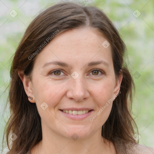 Joyful white adult female with medium  brown hair and brown eyes