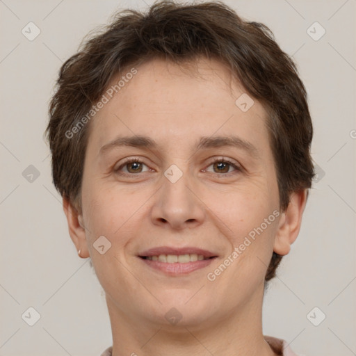 Joyful white adult female with short  brown hair and brown eyes