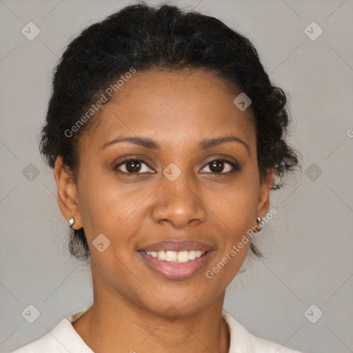 Joyful black young-adult female with short  brown hair and brown eyes