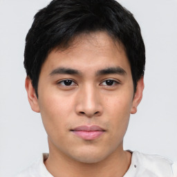 Neutral asian young-adult male with short  brown hair and brown eyes