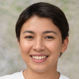 Joyful asian young-adult female with short  brown hair and brown eyes