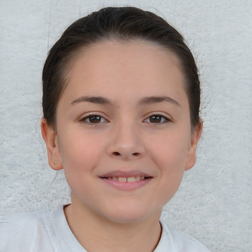 Joyful white child female with short  brown hair and brown eyes