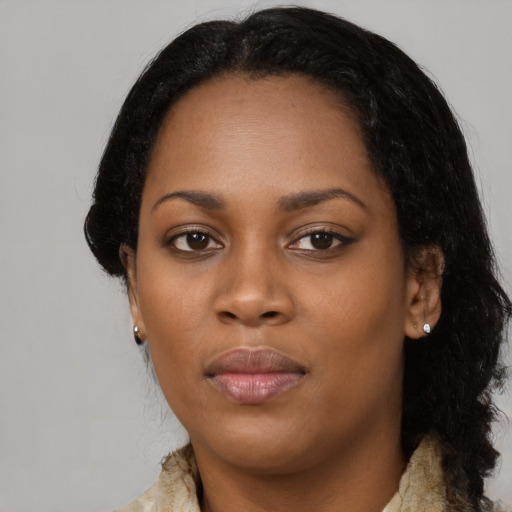 Neutral black young-adult female with long  black hair and brown eyes