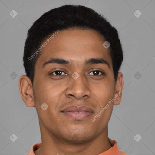 Joyful latino young-adult male with short  brown hair and brown eyes