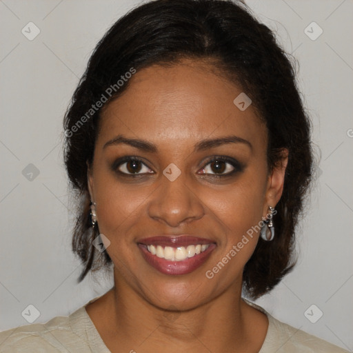 Joyful black young-adult female with medium  brown hair and brown eyes