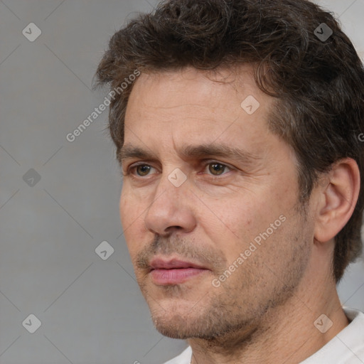 Neutral white adult male with short  brown hair and brown eyes