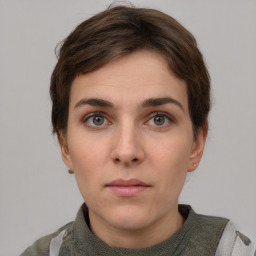 Neutral white young-adult female with short  brown hair and grey eyes